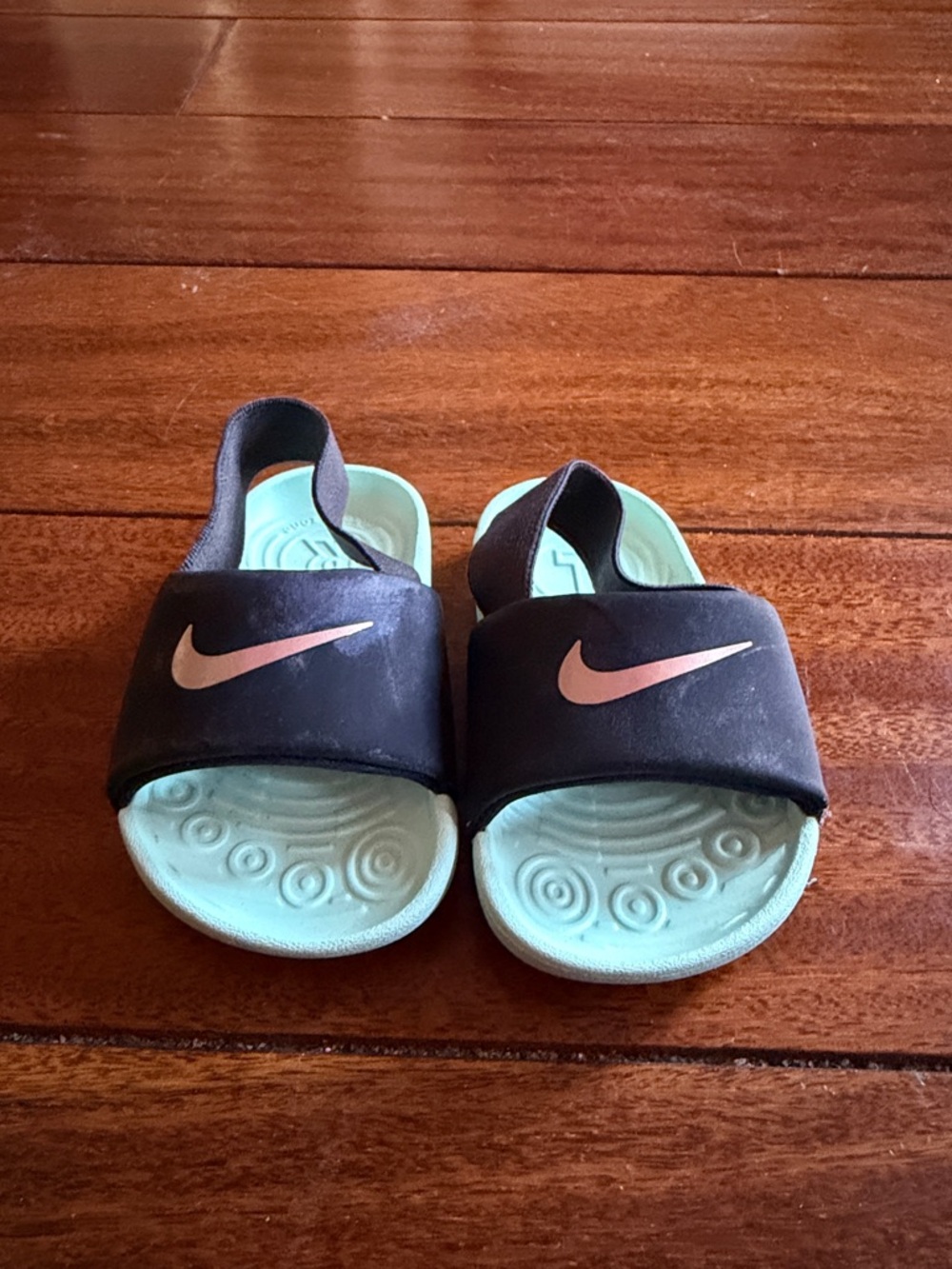 Nike Kids Black Slides with Mint Footbed and Pink Swoosh
